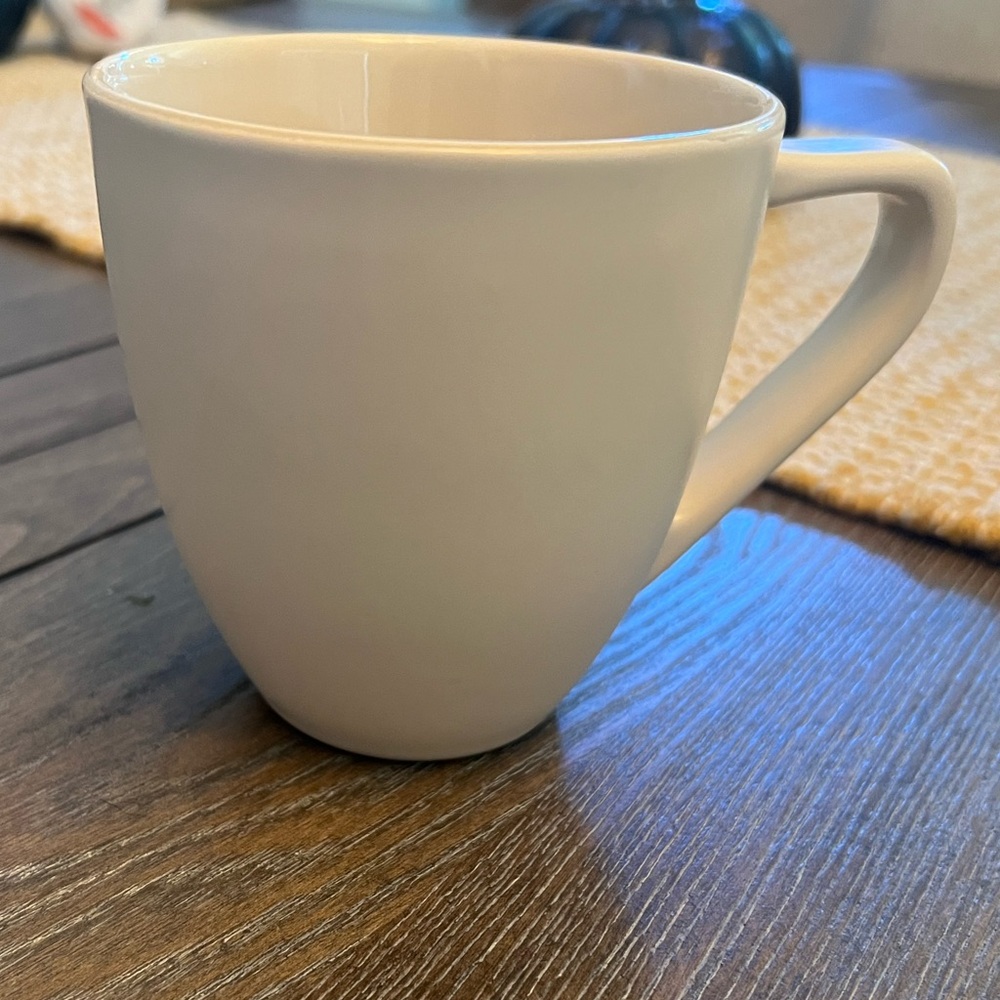 Le Creuset coffee mugs.